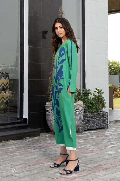 The model in the image is wearing Green Colour Designer Casual Wear Korean BSY Dress from Alice Milan. Crafted with the finest materials and impeccable attention to detail, the Dress looks premium, trendy, luxurious and offers unparalleled comfort. It’s a perfect clothing option for loungewear, resort wear, party wear or for an airport look. The woman in the image looks happy, and confident with her style statement putting a happy smile on her face.