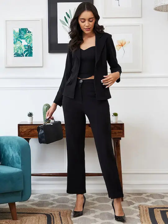 The model in the image is wearing Classy Bossy - Blazer Co ord Set from Alice Milan. Crafted with the finest materials and impeccable attention to detail, the Formal Suit looks premium, trendy, luxurious and offers unparalleled comfort. It’s a perfect clothing option for loungewear, resort wear, party wear or for an airport look. The woman in the image looks happy, and confident with her style statement putting a happy smile on her face.