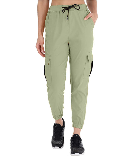 The model in the image is wearing Russian Grey Double Pocket Corgo Pant from Alice Milan. Crafted with the finest materials and impeccable attention to detail, the Cargo Pant looks premium, trendy, luxurious and offers unparalleled comfort. It’s a perfect clothing option for loungewear, resort wear, party wear or for an airport look. The woman in the image looks happy, and confident with her style statement putting a happy smile on her face.