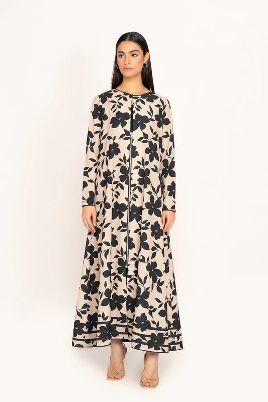 The model in the image is wearing Printed Modest Dress for Women from Alice Milan. Crafted with the finest materials and impeccable attention to detail, the Kaftan / Dress looks premium, trendy, luxurious and offers unparalleled comfort. It’s a perfect clothing option for loungewear, resort wear, party wear or for an airport look. The woman in the image looks happy, and confident with her style statement putting a happy smile on her face.