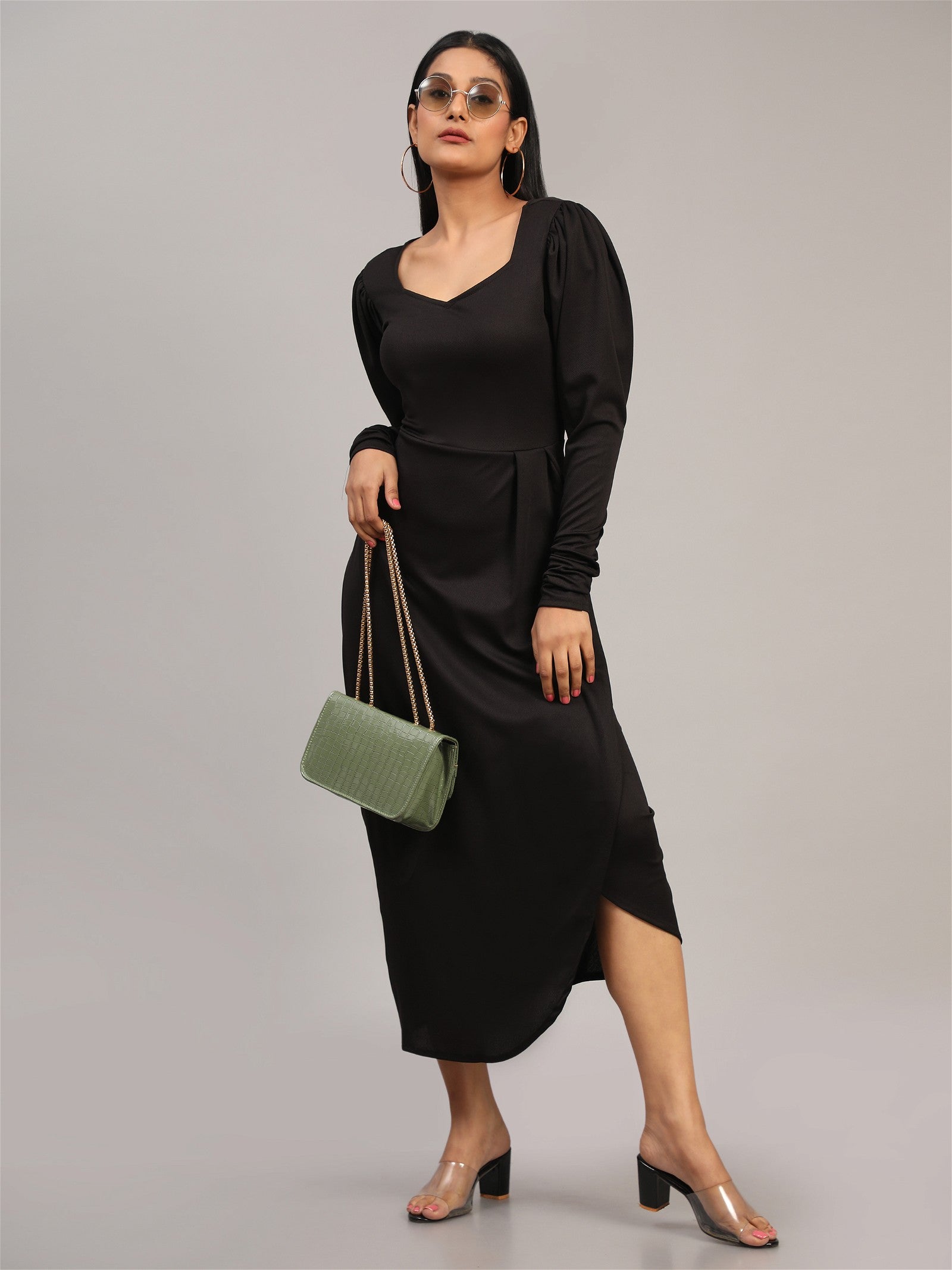 The model in the image is wearing Cotton Lycra tops Western Wear Collection from Alice Milan. Crafted with the finest materials and impeccable attention to detail, the Dress looks premium, trendy, luxurious and offers unparalleled comfort. It’s a perfect clothing option for loungewear, resort wear, party wear or for an airport look. The woman in the image looks happy, and confident with her style statement putting a happy smile on her face.