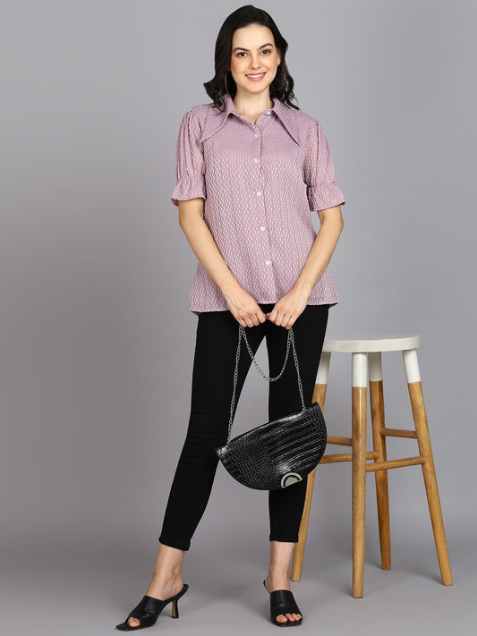 The model in the image is wearing Prettify Womens Lavender Shirt from Alice Milan. Crafted with the finest materials and impeccable attention to detail, the Western Wear Top looks premium, trendy, luxurious and offers unparalleled comfort. It’s a perfect clothing option for loungewear, resort wear, party wear or for an airport look. The woman in the image looks happy, and confident with her style statement putting a happy smile on her face.