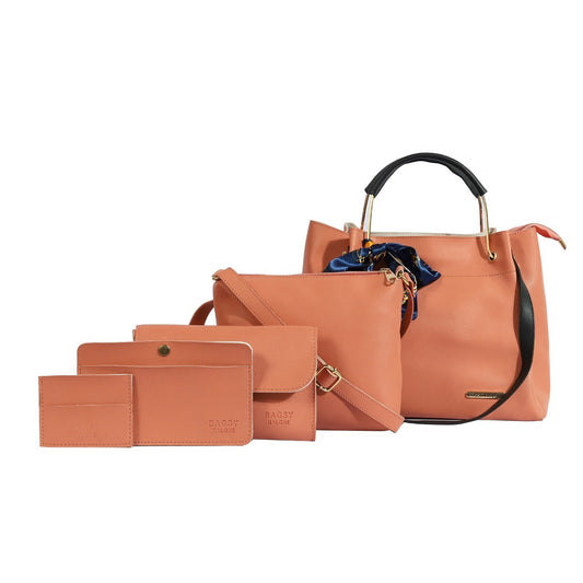 The model in the image is wearing Peach Pack of 5 PU Structured Handheld Bag from Alice Milan. Crafted with the finest materials and impeccable attention to detail, the  looks premium, trendy, luxurious and offers unparalleled comfort. It’s a perfect clothing option for loungewear, resort wear, party wear or for an airport look. The woman in the image looks happy, and confident with her style statement putting a happy smile on her face.